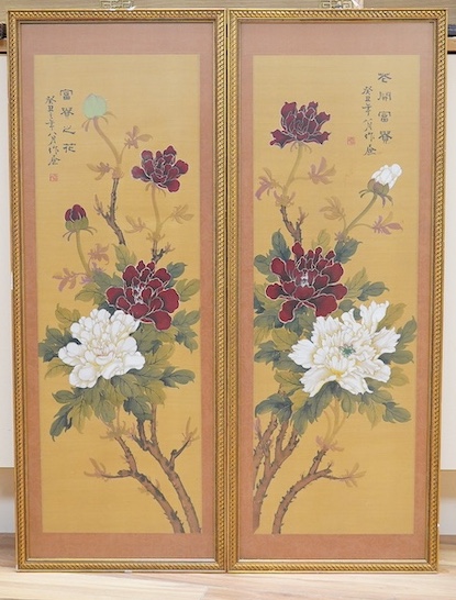 Chinese school, pair of silk panels decorated with chrysanthemums, signed with character and red seal marks, framed, overall 85 x 33cm. Condition - good